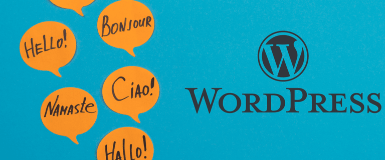 WordPress logo with hello speech bubbles on black background. Grey speech bubbles with hello text.