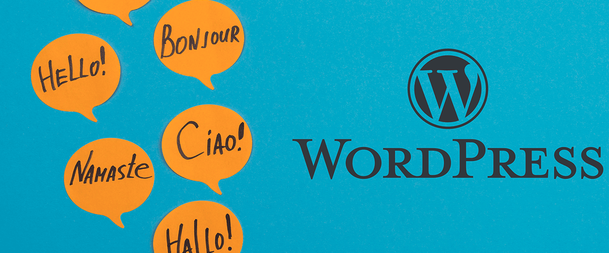 WordPress logo with hello speech bubbles on black background. Grey speech bubbles with hello text.