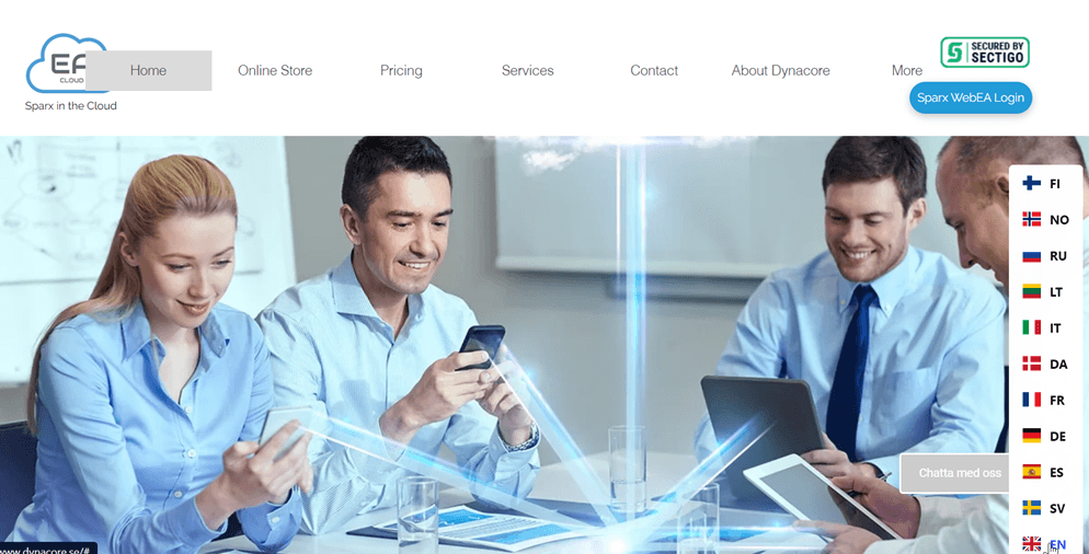 Three men in a meeting, looking at documents. They appear to be in an office setting.