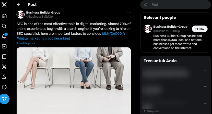 A group of business people in a meeting. They appear to be engaged in discussion.