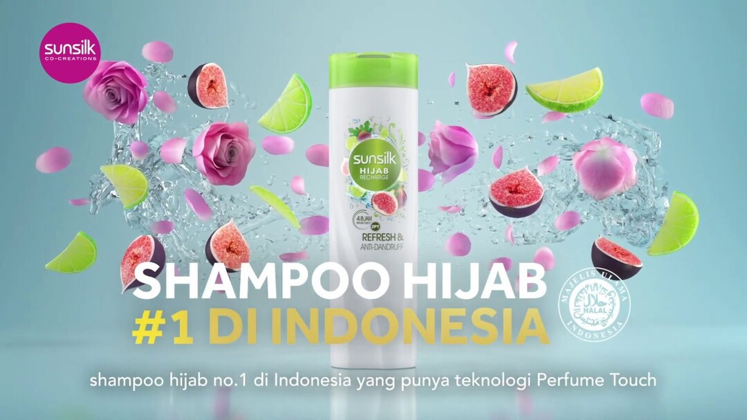 Shampoo bottle with fruit splash and hijab care