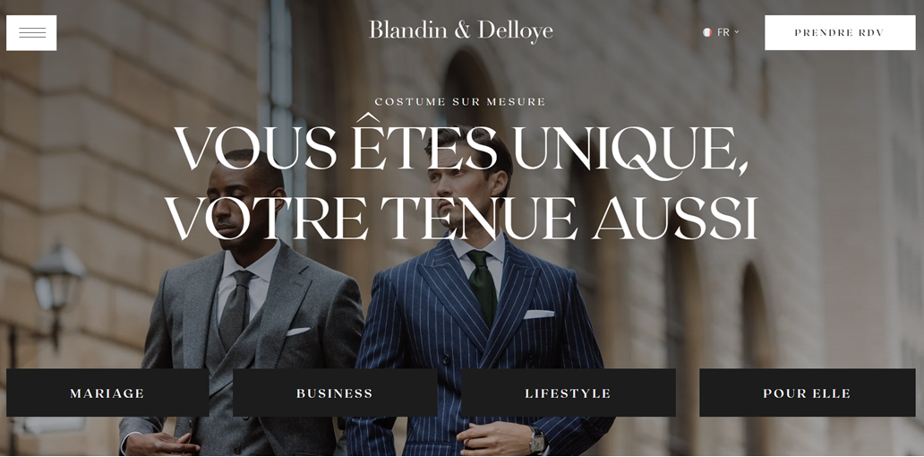 Two men in suits, one gray and one blue pinstripe