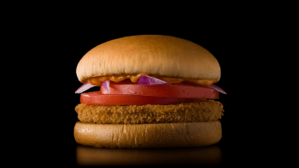 Juicy chicken sandwich with tomato and onion