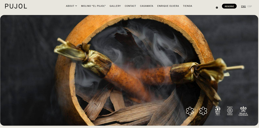 Saffron bundles tied with gold string on wooden base. Smoky background.