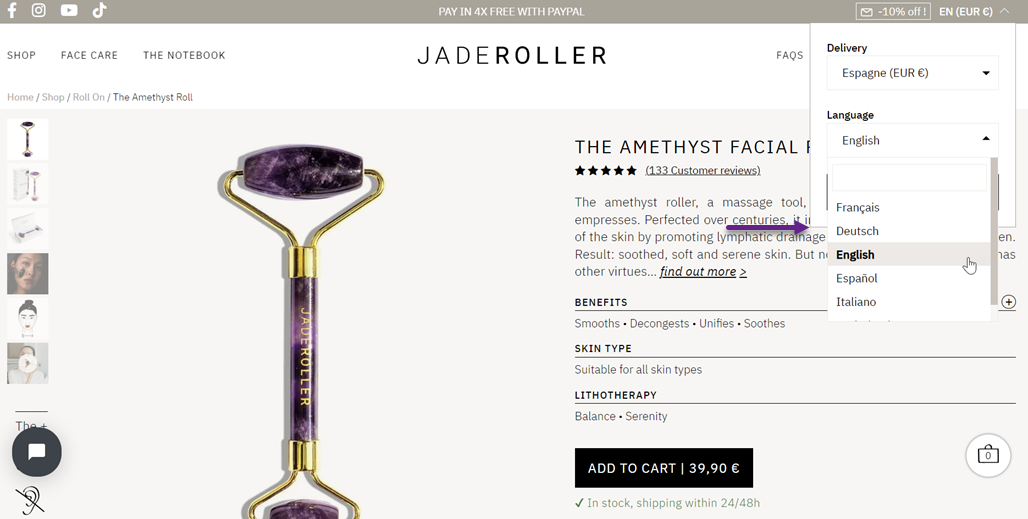 A purple amethyst jade roller for facial skin care. Jade roller tool.