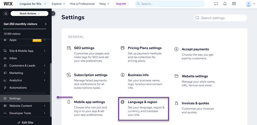 Wix settings panel with language and region options selected. General settings page.